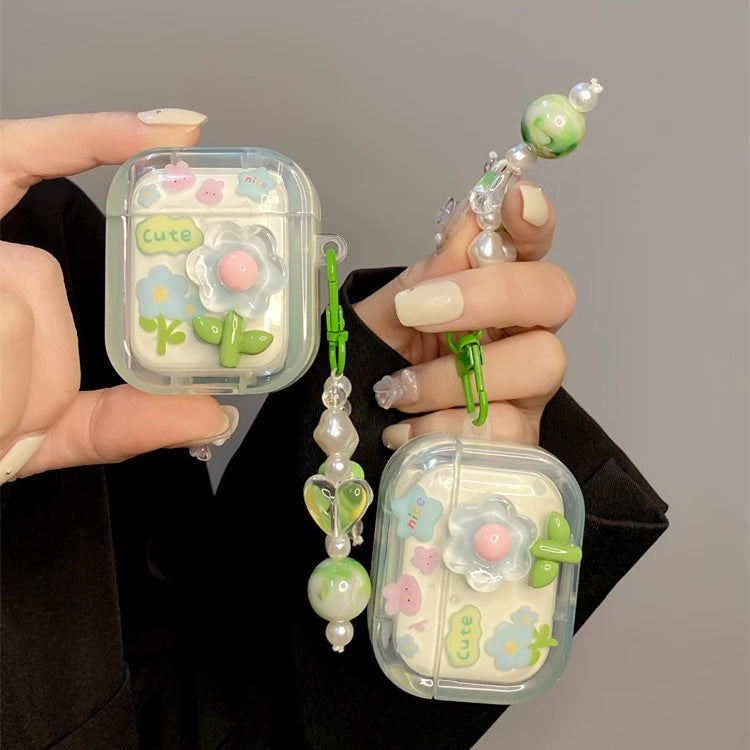 جراب سماعات AirPods مزين بزهرة لطيفة مع تعليقات ملونة
